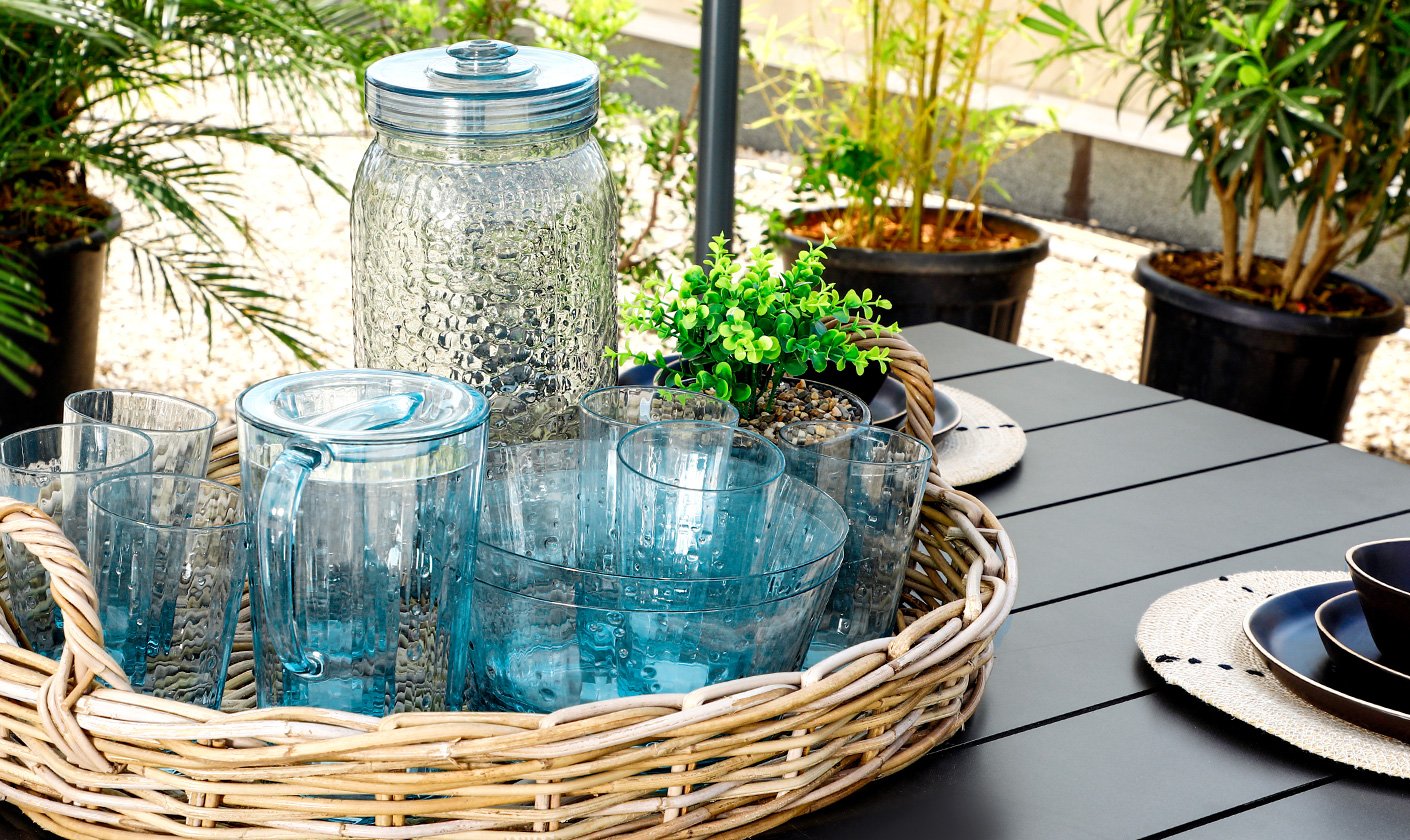 Sophisticated glassware collection, including wine glasses, tumblers, and pitchers for any celebration.